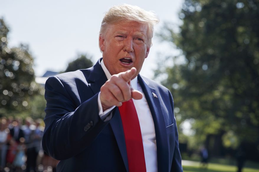 President Donald Trump talks to reporters on the South Lawn of the White House, Friday, Aug. 9, 2019, in Washington, as he prepares to leave Washington for his annual August holiday at his New Jersey golf club. (AP Photo/Evan Vucci)