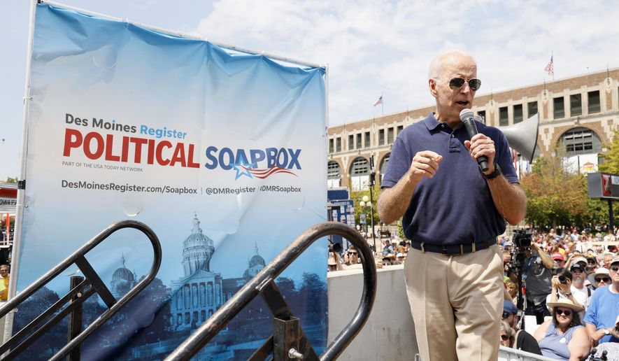 Democratic presidential candidate former Vice President Joe Biden speaks at the Des Moines Register Soapbox during a visit to the Iowa State Fair, Thursday, Aug. 8, 2019, in Des Moines, Iowa. (AP Photo/Charlie Neibergall)
