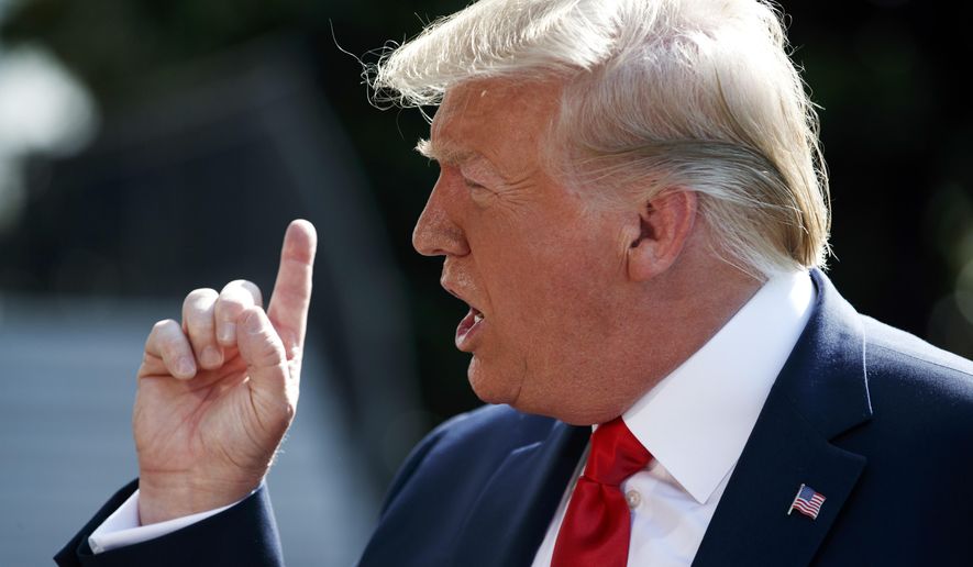 President Donald Trump talks to reporters on the South Lawn of the White House, Friday, Aug. 9, 2019, in Washington, as he prepares to leave Washington for his annual August holiday at his New Jersey golf club. (AP Photo/Evan Vucci)