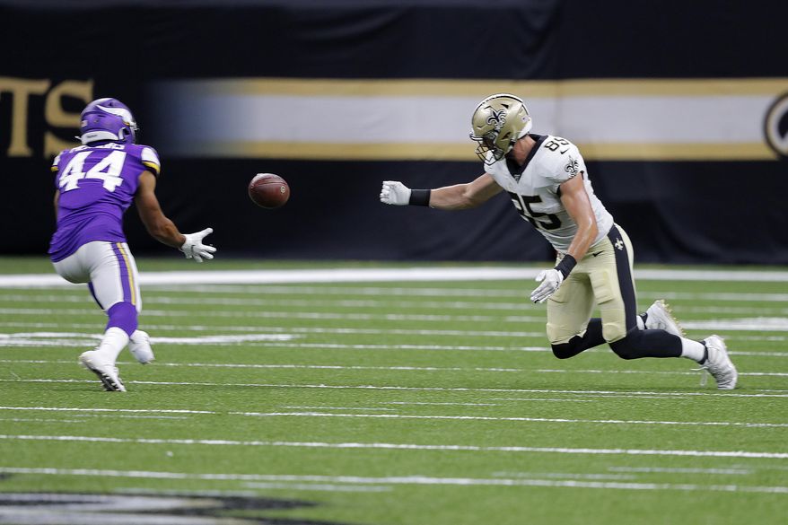 Minnesota Vikings defensive back Nathan Meadors (44) pulls in an interception for a touchdown on a bobbled pass by New Orleans Saints tight end Dan Arnold (85) in the second half of an NFL preseason football game in New Orleans, Friday, Aug. 9, 2019. (AP Photo/Bill Feig)