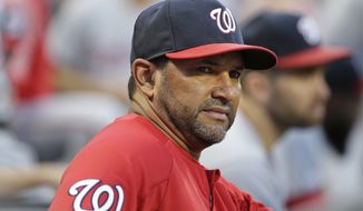 Washington Nationals manager Dave Martinez during the first inning of a baseball game against the New York Mets at Citi Field, Saturday, Aug. 10, 2019, in New York. (AP Photo/Seth Wenig) ** FILE **
