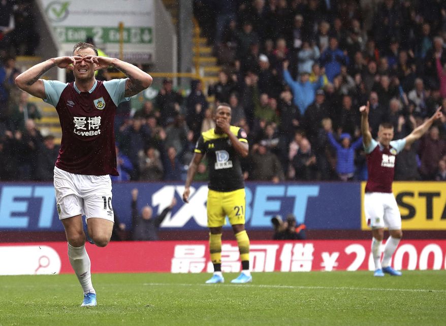 Burnley's Ashley Barnes celebrates scoring his teams second goal during the English Premier League soccer match between Burnley and Southampton at the Turf Moore stadium, Burnley, England. Saturday, Aug, 10 2019 (Martin Rickett/PA via AP)
