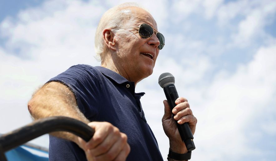 In this Aug. 8, 2019, photo, Democratic presidential candidate former Vice President Joe Biden speaks at the Des Moines Register Soapbox during a visit to the Iowa State Fair in Des Moines, Iowa. Three months after launching his White House bid, Biden remains atop early polling, buoyed by a long history with voters and a belief that his decades of experience best-position him to defeat Trump. Those attributes appear to have helped the former vice president withstand weeks of attacks on his lengthy record in politics. But Biden’s rivals remain confident that his frequent fumbles, like the one in Des Moines, will eventually catch up to him, undermining his electability argument.   (AP Photo/Charlie Neibergall)