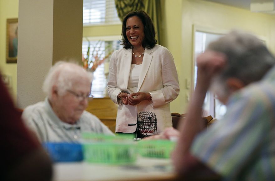 Democratic presidential candidate Sen. Kamala Harris, D-Calif., calls out numbers during bingo at the Bickford Senior Living Center Monday, Aug. 12, 2019, in Muscatine, Iowa. (AP Photo/John Locher)