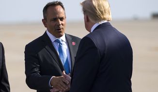 In a Thursday, Aug. 1, 2019, file photo, Gov. Matt Bevin, R-Ky., greets President Donald Trump as he steps off Air Force One at Cincinnati/Northern Kentucky International Airport, in Hebron, Ky., to speak at a campaign rally in Cincinnati. Gov. Matt Bevin’s campaign says President Donald Trump will headline a fundraiser in support of the Republican governor’s reelection campaign on Aug. 21 in Louisville. (AP Photo/Alex Brandon, File)