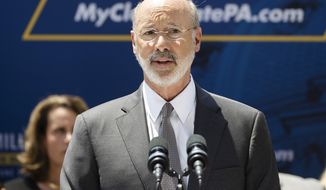FILE - In a Friday, June 28, 2019 file photo, Pennsylvania Gov. Tom Wolf speaks during a news conference in Harrisburg, Pa. Wilf says four children in his state were recently separated from their parents by U.S. Immigration and Customs Enforcement, and he’s demanding a stop to the practice until there’s a plan to ensure children’s welfare. Democratic Gov. Tom Wolf wrote Homeland Security Acting Secretary Kevin McAleenan on Monday, Aug. 12, 2019 seeking an accounting of all children separated from their parents this year in Pennsylvania, how long they were apart and steps taken to ensure their well-being.  (AP Photo/Matt Rourke, File)