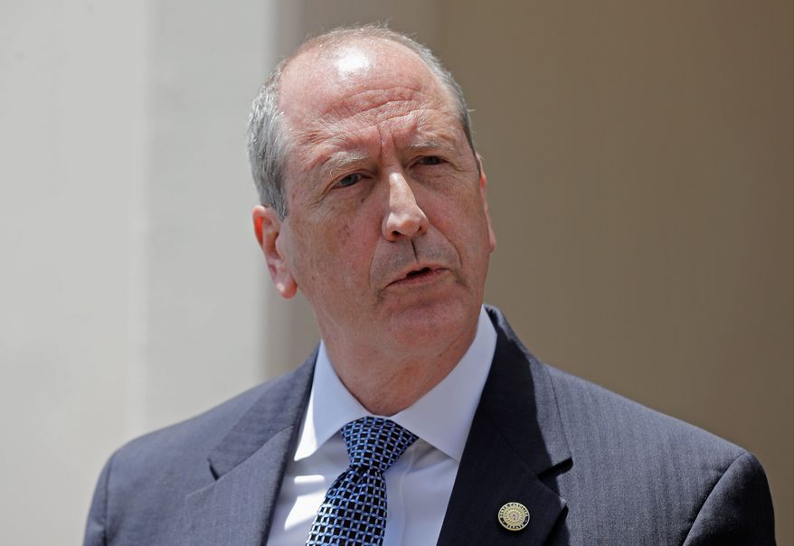 Ninth Congressional district Republican candidate State Sen. Dan Bishop answers a question during a news conference outside McCready's campaign headquarters in Charlotte, N.C., Wednesday, May 15, 2019. Bishop faces McCready, as well as Libertarian and Green candidates, on Sept. 10. (AP Photo/Chuck Burton)