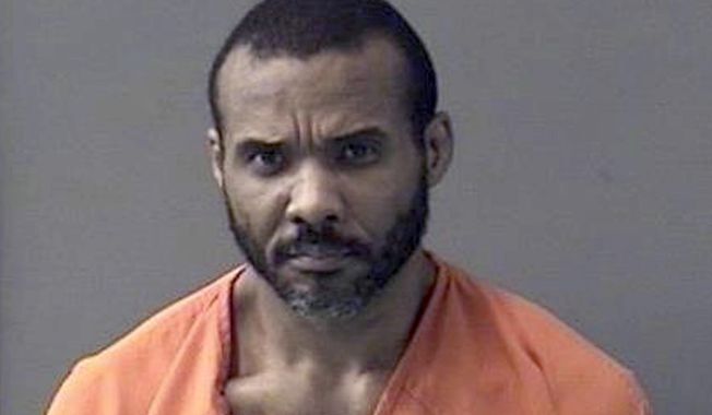 FILE - This undated booking photo released by Bell County Sheriff&#x27;s Office shows Cedric Marks. Prosecutors Monday, in Texas, say they will seek the death penalty for Marks, 45, an MMA fighter accused in the deaths of 28-year-old Jenna Scott and 32-year-old Michael Swearingin, whose bodies were found in a shallow grave in Oklahoma. (Bell County Sheriff&#x27;s Office via AP, File)