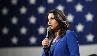 Then-Democratic presidential candidate Rep. Tulsi Gabbard speaks at the Presidential Gun Sense Forum, Saturday, Aug. 10, 2019, in Des Moines, Iowa. Former Hawaii Rep. Tulsi Gabbard doubled down on her scorched-earth takedown of the Democratic Party on Wednesday, calling Vice President Kamala Harris a representation of &quot;everything that is wrong with Washington.&quot; (AP Photo/Charlie Neibergall) ** FILE **