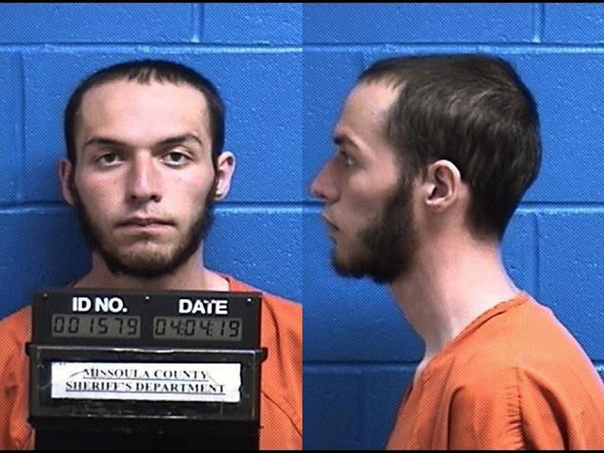File - This April 4, 2019, file photo, released by the Missoula County Sheriff's Office shows Fabjan Alameti, 21. A Montana judge has ordered an FBI informant to wear a wig or hat, false eyeglasses and fake facial hair when testifying against a man who prosecutors say wanted to avenge the death of Muslims killed in shootings at two New Zealand mosques. Federal prosecutors had asked that the courtroom be sealed to the public for the witness' testimony in the upcoming trial of Fabjan Alameti for the safety of the informant and the informant's family in the Middle East. But U.S. District Judge Dana Christensen ruled Monday, Aug. 12, 2019, that a disguise is a reasonable way to protect the witness' identity while preserving Alameti's right to a public trial. (Missoula County Sheriff's Office via AP, File)