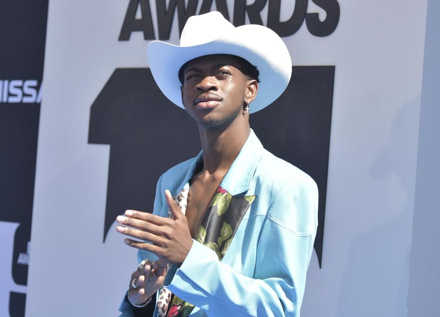 In this June 23, 2019, file photo, Lil Nas X arrives at the BET Awards at the Microsoft Theater in Los Angeles. (Photo by Richard Shotwell/Invision/AP, File)