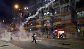 Protesters in Hong Kong have been pressuring Beijing to abide by its promised &quot;one country, two systems&quot; policy that allowed a democratic system to operate. (Associated Press)