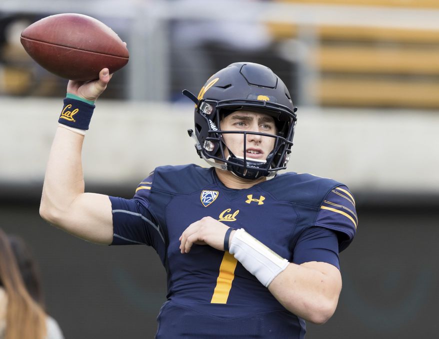 FILE - In this Dec. 1, 2018, file photo, California quarterback Chase Garbers passes during warmups before a football game in Berkeley, Calif. Garbers started 10 games as a redshirt freshman, completing 61.2 percent of his passes with 14 TDs and 10 interceptions. Garbers will likely be the man again this season although UCLA transfer Devon Modster could push him. (AP Photo/John Hefti, File)