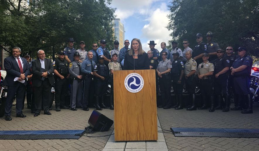 Jamie Pfister, associate administrator for Regional Operations and Program Delivery at the National Highway Traffic Safety Administration, speaks during a news conference at the headquarters of the Department of Transportation in Washington, Wednesday Aug. 14, 2019. About 30,000 police officers will be out in the streets making traffic stops around the United States for the next two weeks in an effort to crack down on impaired driving. (AP Photo/Luis Alonso Lugo)