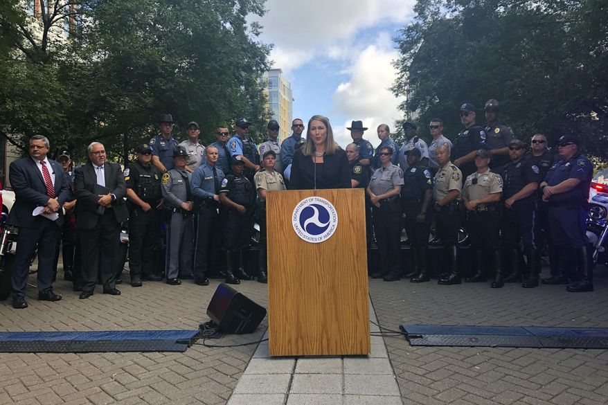 Jamie Pfister, associate administrator for Regional Operations and Program Delivery at the National Highway Traffic Safety Administration, speaks during a news conference at the headquarters of the Department of Transportation in Washington, Wednesday Aug. 14, 2019. About 30,000 police officers will be out in the streets making traffic stops around the United States for the next two weeks in an effort to crack down on impaired driving. (AP Photo/Luis Alonso Lugo)