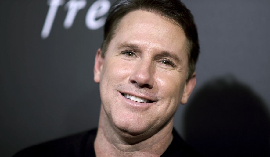 FILE - In this Feb. 1, 2016, file photo, novelist Nicholas Sparks attends a special screening in Los Angeles. The trial is getting underway, Wednesday, Aug. 14, 2019, in a lawsuit that accuses Sparks of defaming the former headmaster of a private Christian school he founded in North Carolina. (Photo by Richard Shotwell/Invision/AP, File)