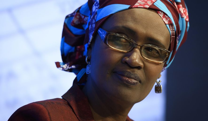 FILE - In this Thursday, Jan 19, 2017 file photo, Winnie Byanyima, Executive Director of Oxfam International, attends the 47th annual meeting of the World Economic Forum, WEF, in Davos, Switzerland. The United Nations has appointed Byanyima, a former Ugandan politician and the current leader of Oxfam International, to be the new executive director of the UN AIDS agency it was announced on Wednesday, Aug. 14, 2019. UNAIDS’ previous chief, Michel Sidibe, left his post early in May, after allegations he improperly handled sexual assault claims against one of Sidibe’s senior deputies.(Gian Ehrenzeller/Keystone via AP, File)