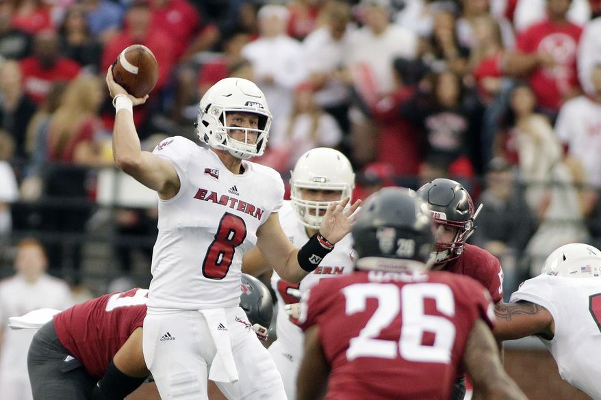 FILE - In this Sept. 15, 2018, file photo, Eastern Washington quarterback Gage Gubrud (8) throws a pass during the first half of an NCAA college football game against Washington State in Pullman, Wash. There’s a good chance Washington State coach Mike Leach will once again turn the Cougars’ Air Raid offense over to a graduate transfer quarterback. The conventional wisdom is that former Eastern Washington quarterback Gage Gubrud is likely to succeed Gardner Minshew. (AP Photo/Young Kwak, File)