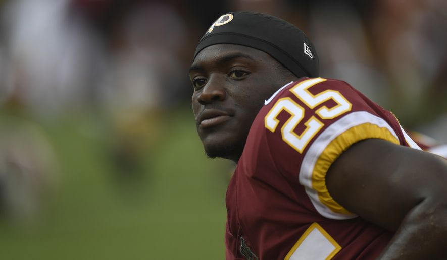 Washington Redskins cornerback Jimmy Moreland (25) warms up before the start of a NFL preseason football game against the Cincinnati Bengals in Landover, Md., Thursday, Aug. 15, 2019. (AP Photo/Susan Walsh)