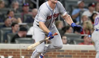New York Mets Pete Alonzo singles in two runs against the Atlanta Braves during the fifth inning of a baseball game Thursday, Aug. 15, 2019, in Atlanta. (AP Photo/Tami Chappell)