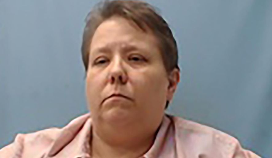 In this Thursday, Aug. 15, 2019 booking photo, provide by the Cross County, Arkansas, Sheriff's Office is Jerri Kelly, the wife of an Arkansas jail administrator who has been arrested after officials say she pulled a gun on four black teenagers fundraising door-to-door for their high school football team. Authorities say Kelly is charged with aggravated assault, false imprisonment and endangering the welfare of a minor. (Cross County Sheriff's Office via AP)