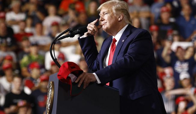 President Donald Trump speaks at a campaign rally, Thursday, Aug. 15, 2019, in Manchester, N.H. (AP Photo/Patrick Semansky)