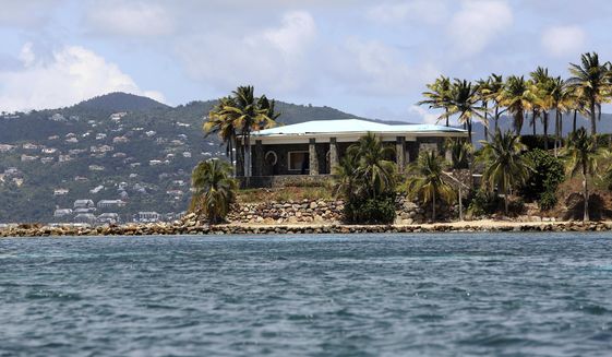 A view of Jeffrey Epstein&#39;s stone mansion on Little St. James Island, a property owned by Jeffrey Epstein, is backdropped by St. John Island, Wednesday, Aug. 14, 2019. Federal authorities consider Little St. James Island to have been Epstein’s primary residence in the United States, a place where at least one alleged victim said in a court affidavit that she participated in an orgy as well as had sex with Epstein and other people. (AP Photo/Gabriel Lopez Albarran) ** FILE **