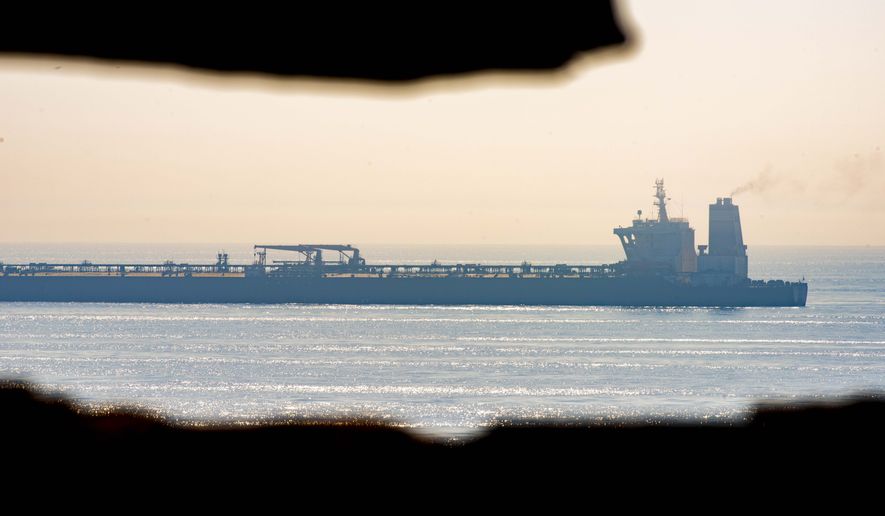 A view of the Grace 1 supertanker stands off the coast of the British territory of Gibraltar, Friday Aug. 16, 2019. The lawyer representing the captain of the Iranian supertanker caught in a diplomatic standoff said Friday that the captain no longer wants to be in command of the ship, which is in need of repairs that could prevent its immediate departure from Gibraltar. (AP Photo/Marcos Moreno)