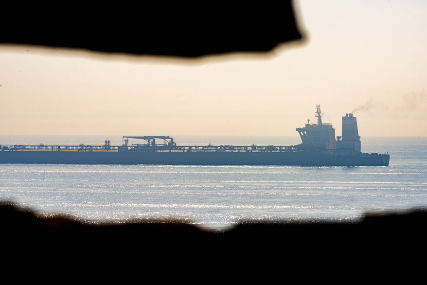 A view of the Grace 1 supertanker stands off the coast of the British territory of Gibraltar, Friday Aug. 16, 2019. The lawyer representing the captain of the Iranian supertanker caught in a diplomatic standoff said Friday that the captain no longer wants to be in command of the ship, which is in need of repairs that could prevent its immediate departure from Gibraltar. (AP Photo/Marcos Moreno)