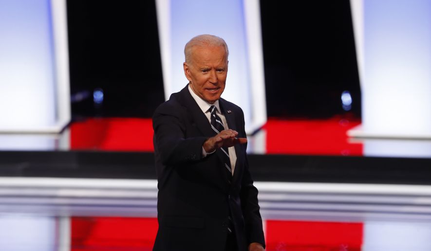 Former Vice President Joe Biden waves after the second of two Democratic presidential primary debates hosted by CNN, July 31, 2019, in the Fox Theatre in Detroit. (AP Photo/Paul Sancya)