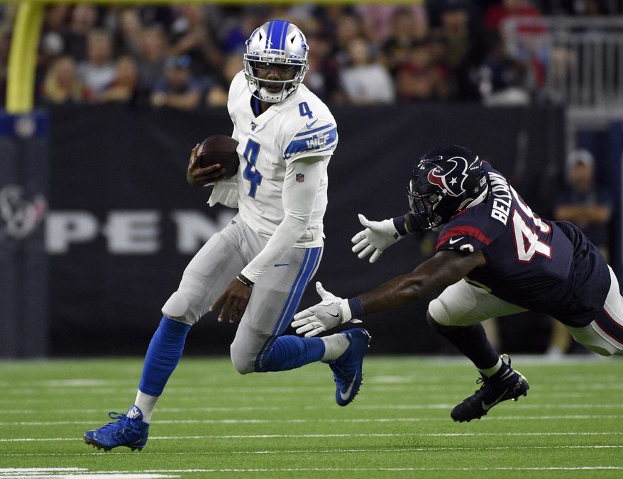 Detroit Lions quarterback Josh Johnson (4) avoids Houston Texans linebacker Davin Bellamy during the first half of an NFL preseason football game Saturday, Aug. 17, 2019, in Houston. (AP Photo/Eric Christian Smith)