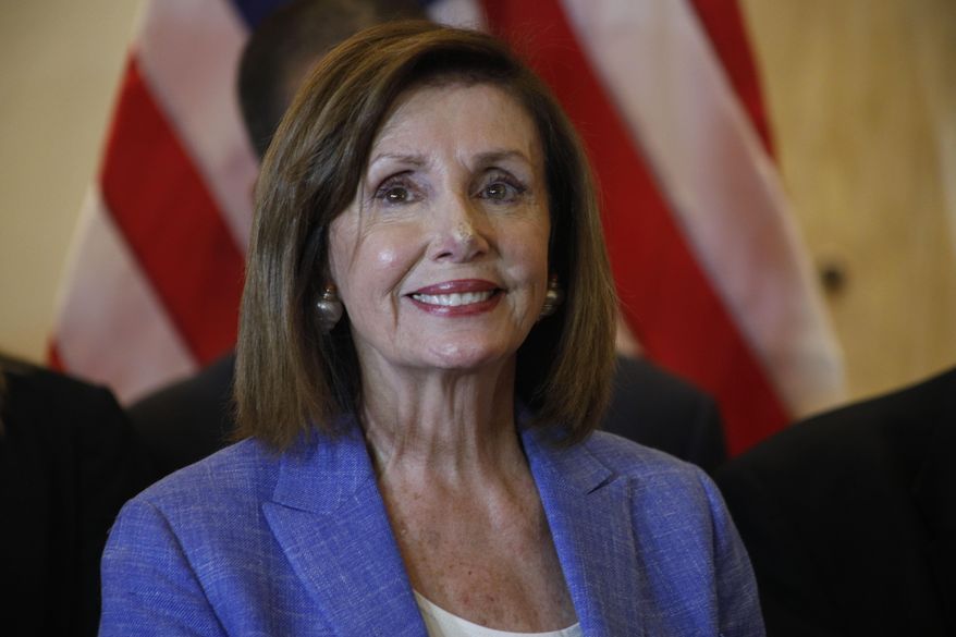 In this Aug. 10, 2019, file photo, House Speaker Nancy Pelosi smiles during a news conference at a hotel in Tegucigalpa, Honduras. There’s an American leader whose words increasingly resonate abroad, who’s adored in foreign capitals and who sends a message just by her arrival. House Speaker Nancy Pelosi has emerged as an alternative ambassador in the Trump era. (AP Photo/Elmer Martinez)