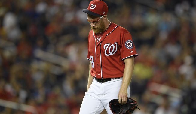 Washington Nationals&#x27; Sean Doolittle walks to the dugout after he was pulled from the baseball game during the ninth inning against the Milwaukee Brewers, Saturday, Aug. 17, 2019, in Washington. The Brewers won 15-14 in 14 innings. (AP Photo/Nick Wass) ** FILE **