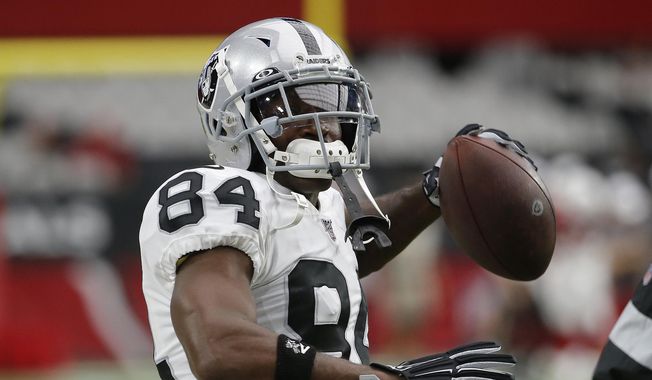 Oakland Raiders wide receiver Antonio Brown (84) warms up prior to an NFL football game against the Arizona Cardinals, Thursday, Aug. 15, 2019, in Glendale, Ariz. (AP Photo/Rick Scuteri) **FILE**