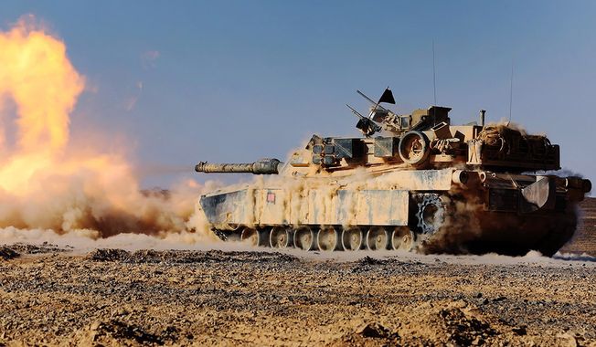 An M1A1 Abrams Main Battle Tank with 24th Marine Expeditionary Unit, fires its 120 mm smoothbore cannon during a live-fire event as part of Exercise Eager Lion 2015 in Jordan, May 9, 2015. (U.S. Marine Corps photo by Sgt. Devin Nichols/Released)