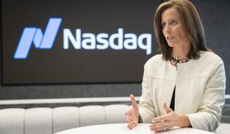 In this Wednesday, July 31, 2019, photo, NASDAQ President and Chief Executive Officer Adena Friedman speaks an interview at NASDAQ headquarters in New York. (AP Photo/Mary Altaffer) **FILE**