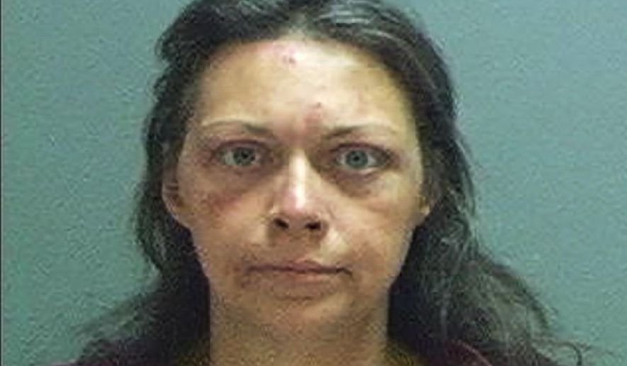 This photo provided by the Salt Lake County Sheriff's Office shows Anne Cockrell. The northern Utah woman has been arrested after authorities say she beat her parents with a cane and oxygen tanks and poured laundry detergent on them. Court documents show that Cockrell was arrested Saturday, Aug. 17, 2019, on suspicion of abuse and assault. Her parents are both over 65 years old. (Salt Lake County Sheriff's Office, via AP)