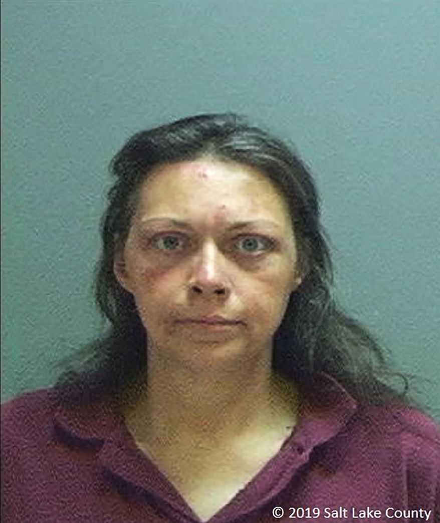 This photo provided by the Salt Lake County Sheriff's Office shows Anne Cockrell. The northern Utah woman has been arrested after authorities say she beat her parents with a cane and oxygen tanks and poured laundry detergent on them. Court documents show that Cockrell was arrested Saturday, Aug. 17, 2019, on suspicion of abuse and assault. Her parents are both over 65 years old. (Salt Lake County Sheriff's Office, via AP)
