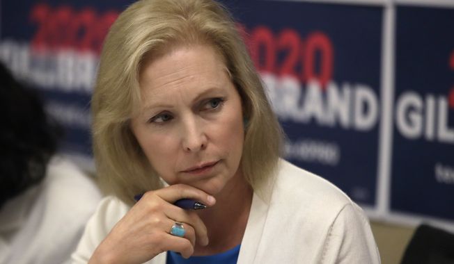 In this file photo, Democratic presidential candidate Sen. Kirsten Gillibrand, D-N.Y., listens during a mental health roundtable discussion, Tuesday, Aug. 20, 2019, in Manchester, N.H. (AP Photo/Elise Amendola)  **FILE**
