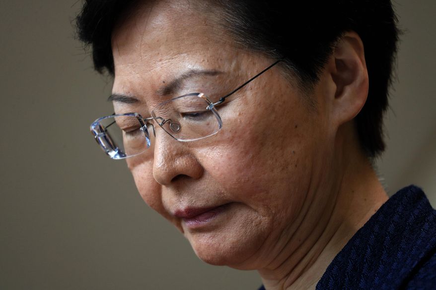 Hong Kong Chief Executive Carrie Lam pauses during a press conference in Hong Kong Tuesday, Aug. 20, 2019. Lam said she’s setting up a “communication platform” to resolve differences in the Chinese city, which has been wracked by months of chaotic anti-government protests. She also said a fact-finding study will look at the causes of the protests and the police response to them. (AP Photo/Vincent Yu)