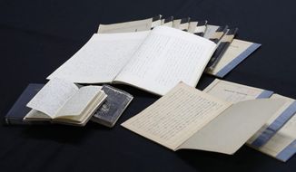This Monday, Aug. 19, 2019, photo shows journals and notebooks kept by Michiji Tajima, a former top Imperial Household Agency, in Tokyo. Japan’s wartime Emperor Hirohito repeatedly felt sorry about World War II and tried, although unsuccessfully, to include the word “remorse” in his 1952 speech, documents obtained by NHK TV show. The records of conversations spanning nearly five years with Hirohito were kept by Tajima who took office after the war. (Kyodo News via AP)