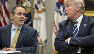 FILE - In this Thursday, Jan. 11, 2018, file photo, President Donald Trump, right, and Kentucky Gov. Matt Bevin, left, talk during a prison reform roundtable in the Roosevelt Room of the Washington.  Bevin’s reelection campaign recently placed nearly $4 million worth of advertising on TV and radio leading up to his November 2019 showdown with Democrat Andy Beshear. The Republican governor’s campaign is looking to reap a financial windfall when President Donald Trump headlines a private fundraiser for Bevin on Wednesday, Aug. 21, 2018 in Louisville.  (AP Photo/Carolyn Kaster, File)