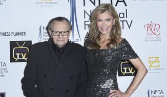 In this Dec. 5, 2018, file photo Larry King, left, and Shawn King attend the 2018 National Film &amp;amp; Television Awards at the Globe Theatre in Los Angeles. King has filed for divorce from his seventh wife, Shawn King, after 22 years. The 85-year-old talk show host filed a petition to end the marriage Tuesday, Aug. 20, 2019, in Los Angeles Superior Court. (Photo by Richard Shotwell/Invision/AP)