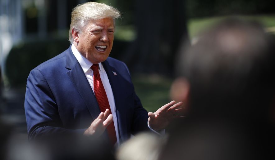 President Donald Trump speaks with reporters before departing on Marine One on the South Lawn of the White House, Wednesday, Aug. 21, 2019, in Washington. Trump is headed to Kentucky. (AP Photo/Patrick Semansky)