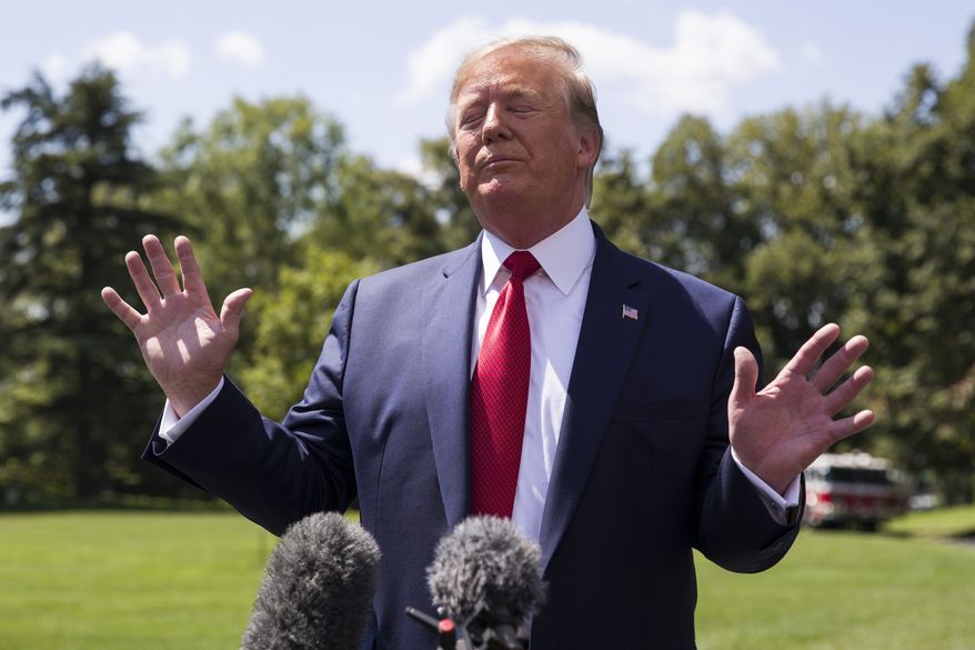 President Donald Trump pauses while speaking with reporters before departing on Marine One on the South Lawn of the White House, Wednesday, Aug. 21, 2019, in Washington. Trump is headed to Kentucky. (AP Photo/Alex Brandon)