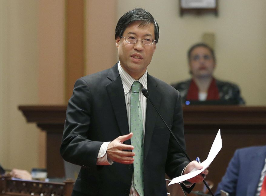 FILE - In this May 22, 2019, file photo, State Sen. Richard Pan, D-Sacramento, calls on lawmakers to approve his measure to toughen the rules for vaccination exemptions in Sacramento, Calif. An anti-vaccine activist has been cited for assault after pushing Pan on a sidewalk near the Capitol. Kenneth Austin Bennett livestreamed the confrontation on his Facebook page. It shows him shoving Pan in the back after questioning him on vaccinations. The Sacramento Police Department say they cited Bennett on a misdemeanor assault charge then released him. (AP Photo/Rich Pedroncelli, File)