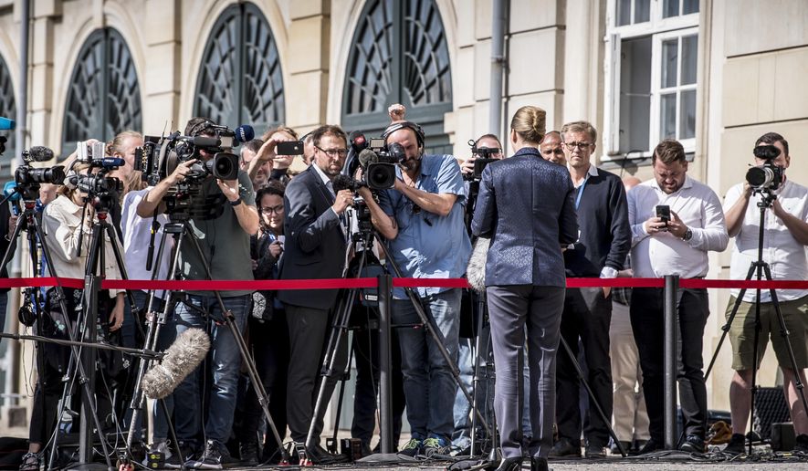 Denmark's Prime Minister Mette Frederiksen faces the media to give a statement about US President's cancellation of his scheduled State Visit, in front of the State Department in Copenhagen, Wednesday, Aug. 21, 2019. U.S. President Trump announced his decision to postpone a visit to Denmark by tweet on Tuesday Aug. 20, 2019, after Danish Prime Minister Mette Frederiksen dismissed the notion of selling Greenland to the U.S. as "an absurd discussion." (Mads Claus Rasmussen / Ritzau Scanpix)