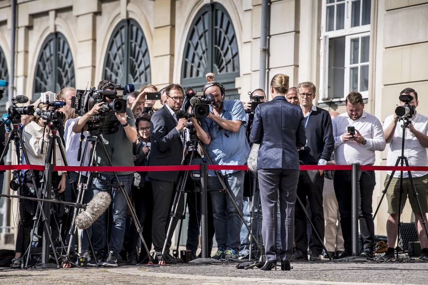 Denmark's Prime Minister Mette Frederiksen faces the media to give a statement about US President's cancellation of his scheduled State Visit, in front of the State Department in Copenhagen, Wednesday, Aug. 21, 2019. U.S. President Trump announced his decision to postpone a visit to Denmark by tweet on Tuesday Aug. 20, 2019, after Danish Prime Minister Mette Frederiksen dismissed the notion of selling Greenland to the U.S. as "an absurd discussion." (Mads Claus Rasmussen / Ritzau Scanpix)