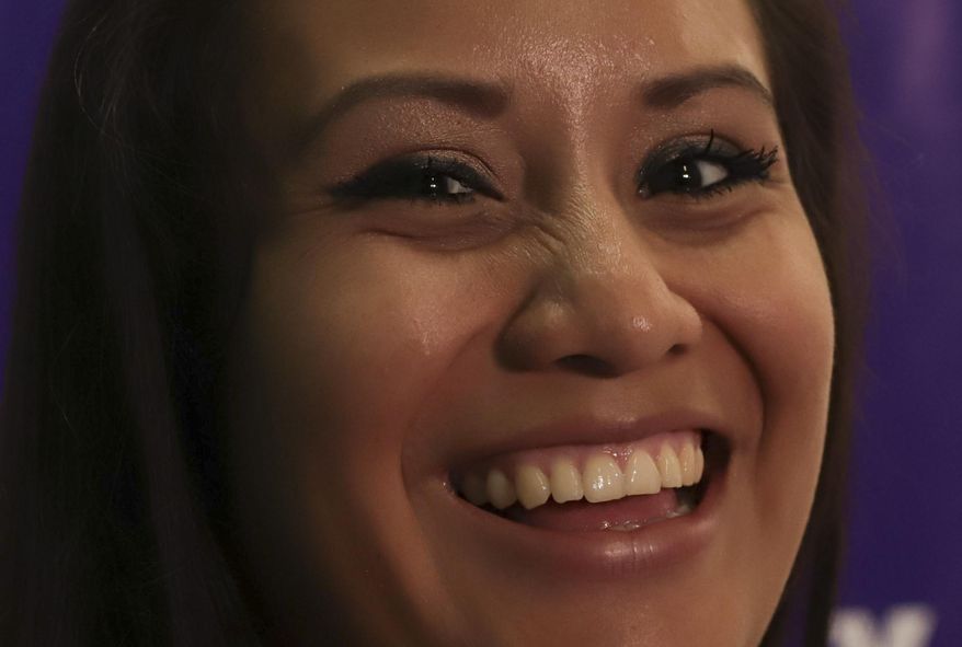 Evelyn Beatriz Hernandez, a 21-year-old Salvadoran woman who was originally sentenced to 30 years in prison for aggravated homicide after suffering a miscarriage in 2016, smiles as she answers questions from journalists two days after her acquittal on retrial, at the offices of Colectivo Feminista in San Salvador, El Salvador, Wednesday, Aug. 21, 2019. Hernandez, who spent nearly three years in jail, said Wednesday "Now that I'm free, I feel like I've come back to life." (AP Photo/Salvador Melendez)