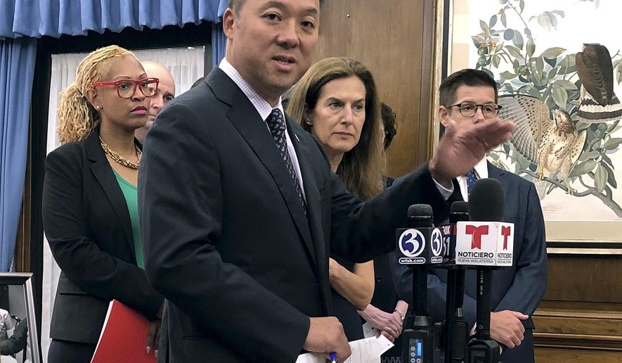 Connecticut Attorney General William Tong speaks in his office, Wednesday, Aug. 21, 2019, in Hartford, Conn., about the potential impact on thousands of state residents by planned rule changes for public benefits for immigrants. (AP Photo/Susan Haigh)